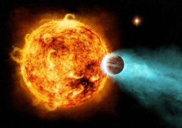 Καλλιτεχνική απεικόνιση ενός καυτού Δία που κινείται σε τροχιά γύρω από ένα άστρο ενός δυαδικού συστήματος. Credit: NASA/CXC/Univ of Hamburg/S.Schroter et a
