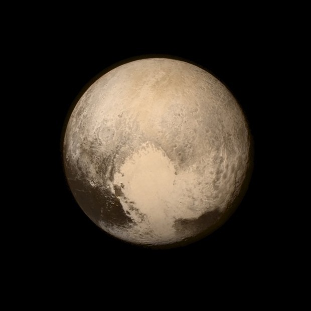 Pluto nearly fills the frame in this image from the Long Range Reconnaissance Imager (LORRI) aboard NASA's New Horizons spacecraft, taken on July 13, 2015, when the spacecraft was 476,000 miles (768,000 kilometers) from the surface and released on July 14, 2015. More than nine years after its launch, the U.S. spacecraft sailed past Pluto on Tuesday, capping a 3 billion mile (4.88 billion km) journey to the solar system’s farthest reaches, NASA said. This is the last and most detailed image sent to Earth before the spacecraft's closest approach to Pluto on July 14. The color image has been combined with lower-resolution color information from the Ralph instrument that was acquired earlier on July 13. This view is dominated by the large, bright feature informally named the "heart" which measures approximately 1,000 miles (1,600 kilometers) across. The heart borders darker equatorial terrains, and the mottled terrain to its east (right) are complex. However, even at this resolution, much of the heart's interior appears remarkably featureless - possibly a sign of ongoing geologic processes.     REUTERS/NASA/APL/SwRI/Handout  ATTENTION EDITORS - FOR EDITORIAL USE ONLY. NOT FOR SALE FOR MARKETING OR ADVERTISING CAMPAIGNS. THIS IMAGE HAS BEEN SUPPLIED BY A THIRD PARTY. IT IS DISTRIBUTED, EXACTLY AS RECEIVED BY REUTERS, AS A SERVICE TO CLIENTS