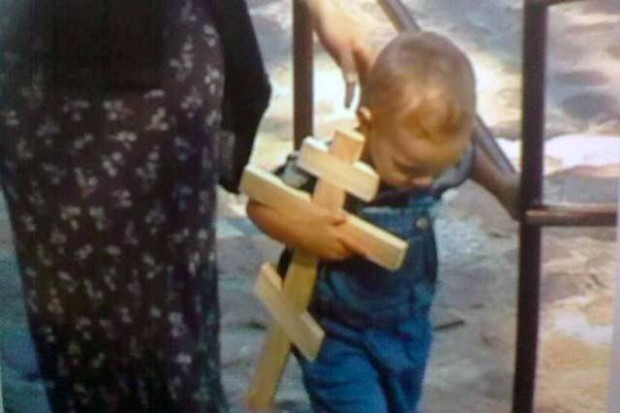 child with cross 2