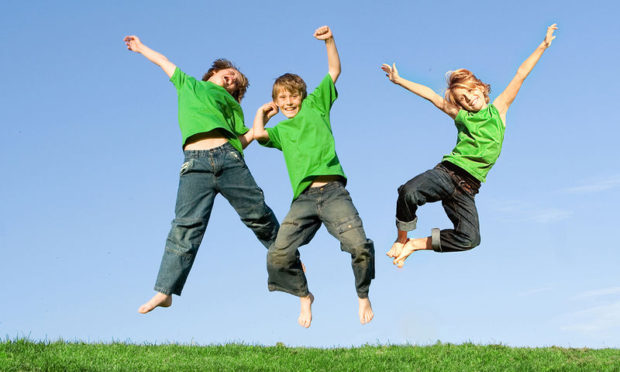 bigstock-Happy-Smiling-Kids-Jumping-For-2849593