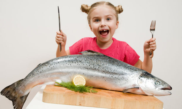 bigstock-little-girl-and-big-fresh-fish-16368923