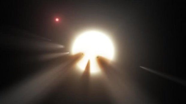  Καλλιτεχνική απεικόνιση ενός σμήνους κομητών γύρω από το μυστηριώδες άστρο. Τελικά όμως η θεωρία των κομητών δεν μπορεί να εξηγήσει τη συμπεριφορά του. (Φωτογραφία: NASA/JPL-Caltech ) 