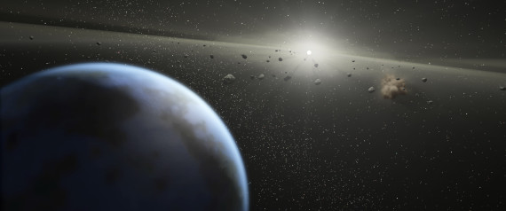 SPACE - UNDATED: An artists impression showing an asteroid belt around a star similar in size to the sun. MEET Brit Lightyear - the British spaceman who could be called upon to save the world from Armageddon. Major Tim Peake, 40 - Britain's first official astronaut - is part of a specialist team training to land on an asteroid, just like in the Hollywood blockbuster starring Bruce Willis. Their research could prove vital in preventing a catastrophic collision that would see life on earth wiped out. The mission, carried out by NASA Extreme Environment Missions Operations, will eventually see the a manned shuttle propelled up to three million miles into space. There they will reach speeds of up to 55,000mph through a swing-by - where a planets gravity is used to increase speed - as they attempt to dock on the surface and carry out crucial research. But should an meteorite find itself on a catastrophic collision course with earth, a manned mission could be used to deflect it. And Brit Tim would be in line to answer the call as bruce Willis' oil magnate character did in the hit film Armageddon. PHOTOGRAPH BY NASA / Barcroft Media /Barcoft Media via Getty Images