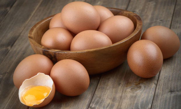 bigstock-Eggs-In-A-Wooden-Bowl-79286554